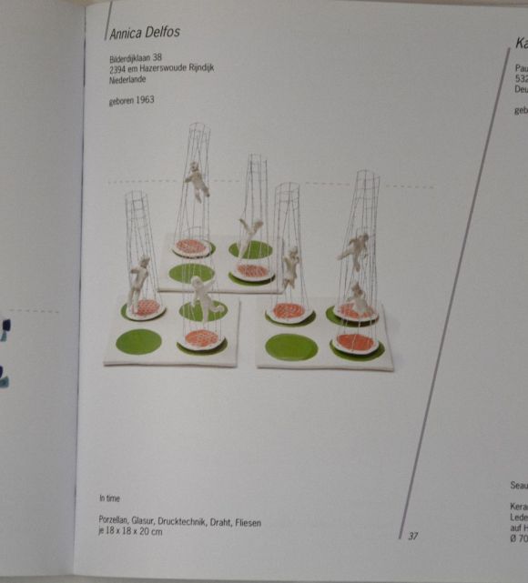 In Time , a moveable. porcelain mixed media.